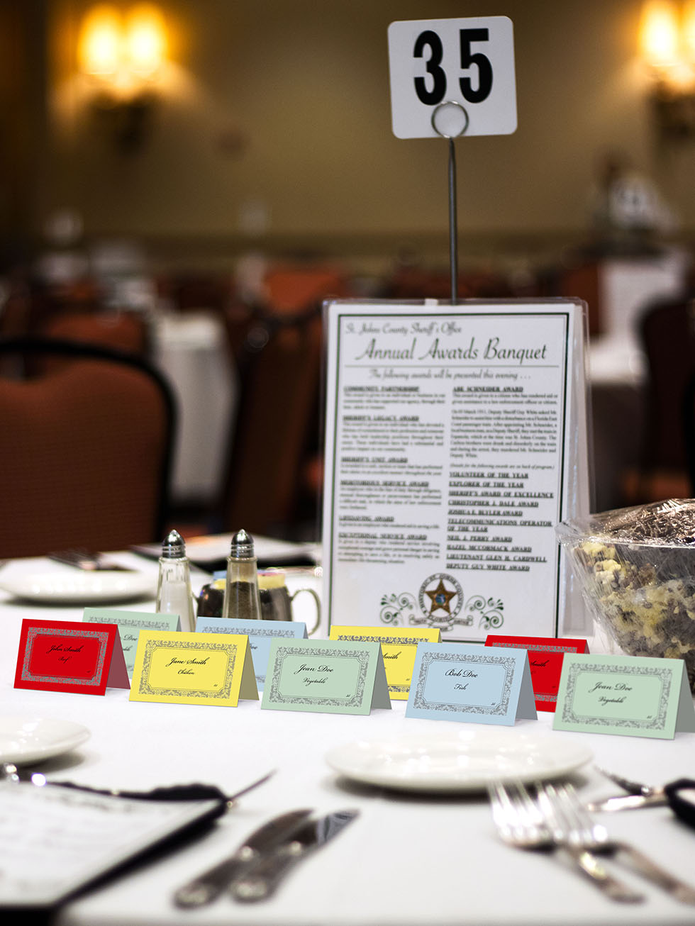 Mock-up of different color place cards on table